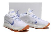 Pair of white and blue shoes shown from the front and side.