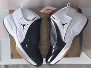 Top-down view of the pair showing the black-and-white color blocking and gum-colored outsole edges.