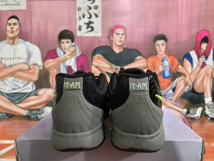 Rear view of black and grey Nike basketball sneakers showing padded collars, grey heel panels, and heel branding details.