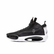 Black Air Jordan 34 basketball shoe with a white midsole and black outsole details.