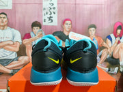 Rear view of Nike basketball shoes showing blue heel sections and yellow Swoosh logos