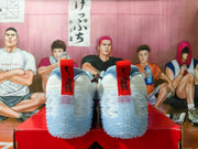 Rear view showing the white textured heels, red pull tabs, and padded collars of the sneakers.