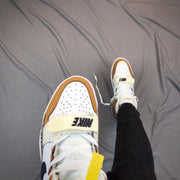 Close view of the perforated toe and midfoot strap on the Air Jordan Legacy 312