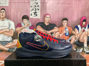 Side profile highlighting the navy upper, red laces, perforated panels, side Swoosh, and layered sole.