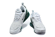 Front views of the white Nike Air Max 270 sneakers with dark green details.