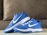 Two blue and white sneakers arranged together, showing the side branding, textured uppers, and white midsoles.