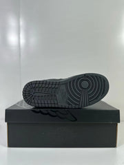 Bottom view showing the patterned dark outsole of a low-top sneaker