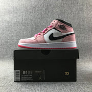 Side view of the sneaker placed on its black product box; the box shows size 5.5, EU 38, style code 852542 801 and Air Jordan 1 Mid labeling.