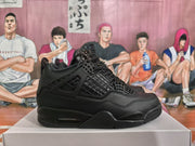 Side profile of a black high-top sneaker with grid overlays, padded ankle collar, layered midsole, and rubber outsole.