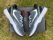 Top view of the shoes displayed over a shoebox