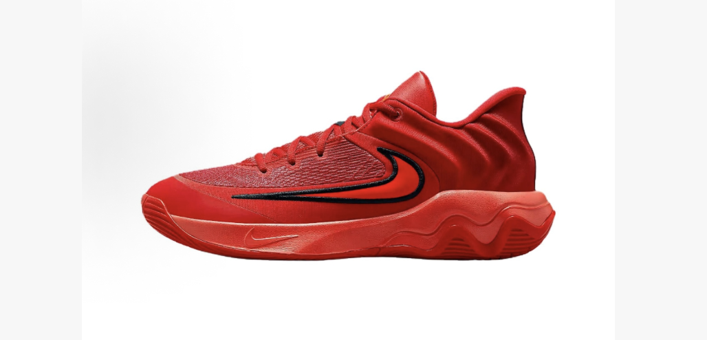 Side view of red Nike basketball shoes with a black-outlined Swoosh and sculpted red sole