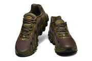 Front view of olive and brown Nike Air Max DN sneakers with lace-up closure.