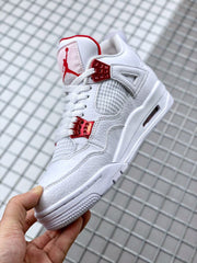 Angled side view showing the white upper, textured panel, red eyelets, and visible sole window.