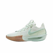 Side view of a white and pale green Nike GT Cut 3 sneaker with mint accents and a translucent gum-colored toe outsole.