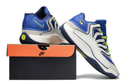 White and royal blue Nike KD 18 sneakers arranged with a shoebox.