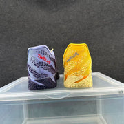 Rear view of lavender and navy and golden yellow shoes