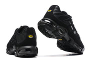 Rear and outsole views showing heel details and sculpted black soles