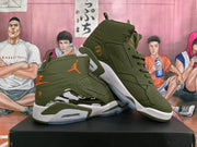Pair of olive green Jordan high-top sneakers showing perforated side panels and orange branding