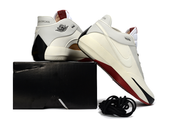 Off-white Jordan 40 sneakers shown from the heel and side beside a black box.