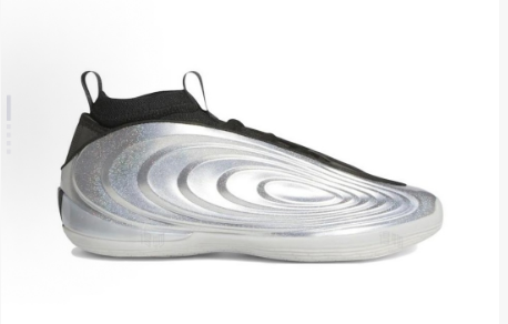 Side view of silver and black low-top sneakers with layered wave-like paneling and a light outsole.