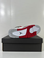Outsole view showing the red and white tread pattern with a black Jumpman mark.