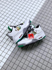 Two matching white Jordan sneakers arranged together on a gridded surface with a red hangtag visible.