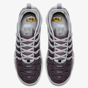 Top view showing the laces and dark-to-grey upper of the Nike Air VaporMax Plus sneakers