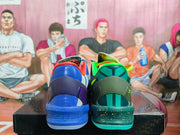 Rear view of the mismatched pair, showing differently colored heel counters and soles.