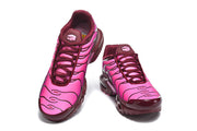Top and front views of pink and burgundy Nike Air Max Plus sneakers