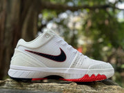 Reverse side view showing the white upper and red outsole details