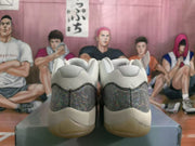 Rear view of the pair showing gray patterned heel panels, white collars, and translucent-tinted soles.