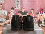 Rear view of the black heels with a visible number 20