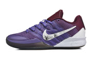 Side profile of a purple basketball shoe with a white floral Swoosh, burgundy collar, and dark outsole