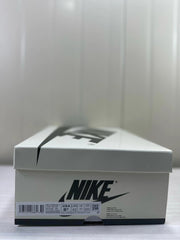Shoe box label showing Air Jordan 1 Low OG, style code DM7866 200, and EU size 42.