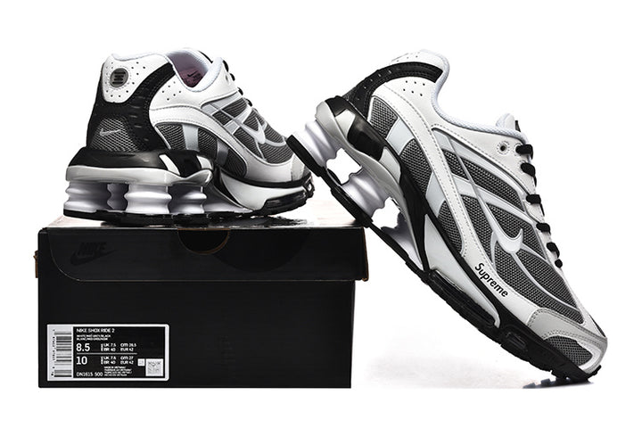 Nike Shox Ride 2 sneakers displayed on a shoe box; the box label reads Nike Shox Ride 2 and shows size 8.5 and style code CN3165 500.