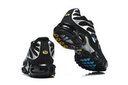Nike Air Max Plus sneakers showing heel details and outsole