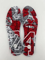 Pair of red, white, gray, and black patterned insoles with circular labels reading 260(2.5).