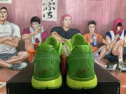Rear view of green Nike Kobe basketball shoes showing the heel details