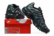 Green and black Nike Air Max Plus sneakers displayed on a box; the box label shows sample size EU 42.