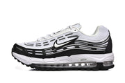 Side profile of black and white Nike Air Max 97 sneakers.