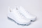 Pair of white Nike TN-2 sneakers viewed from the front and side.