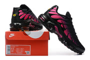 Nike Air Max Plus shoes displayed with a box label showing sample sizes