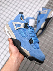Angled front-side view of the blue Air Jordan 4 sneaker with blue laces, mesh panels, and black accents.