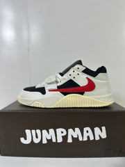 Side profile showing the red Swoosh, black side panel, white overlays, and ribbed outsole.