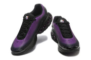 Top and front views of black and purple Nike Air Max DN sneakers