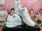 Pair of white Nike basketball sneakers shown from angled side and front views.
