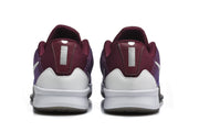 Rear view of purple basketball shoes with burgundy heel panels and white midsoles