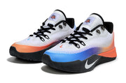 Pair of white Nike S.T. Flare EP shoes with blue and orange mismatched accents.