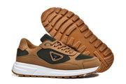 Low-top sneaker shown beside its brown lugged outsole.