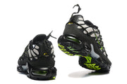 Rear and outsole views of Nike Air Max Plus sneakers
